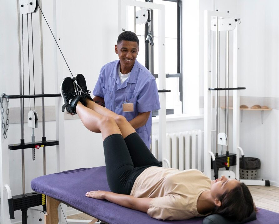 Therapist supporting client with rehabilitation and daily living skills